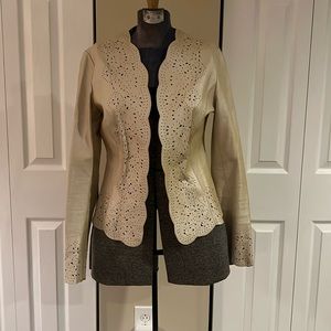 This pretty gold leather jacket will look stunning dressed up or dressed down.